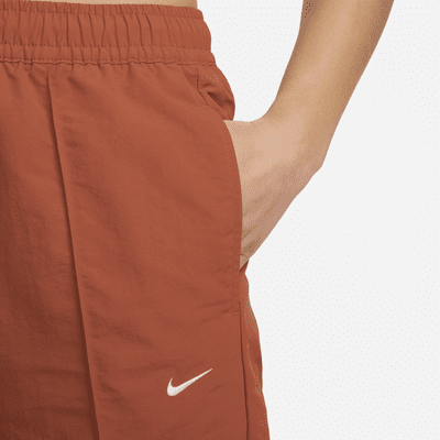 Pants de tiro medio con dobladillo abierto para mujer Nike Sportswear Everything Wovens