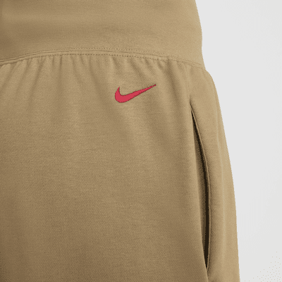 Damskie spodnie z dzianiny dresowej o kroju oversize ze średnim stanem Nike Sportswear Breaking