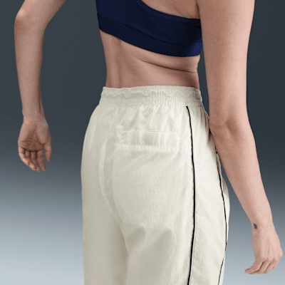 Pants con dobladillo abierto de tejido Woven de tiro alto para mujer Nike Windrunner