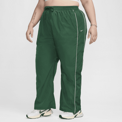 Pants con dobladillo abierto de tejido Woven de tiro alto para mujer Nike Windrunner (talla grande)