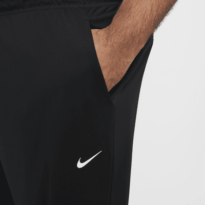 Pants Dri-FIT versátiles con dobladillo abierto para hombre Nike Totality