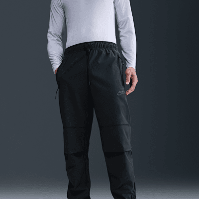 Pantaloni in tessuto Nike Tech – Uomo