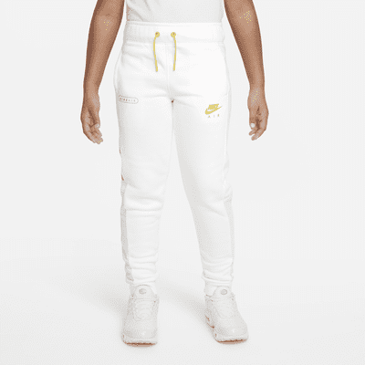 white and gold nike sweatpants