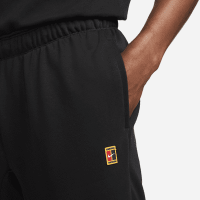 Calças de ténis em tecido moletão NikeCourt Heritage para homem