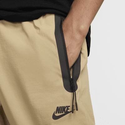 Męskie spodnie z tkaniny Nike Tech