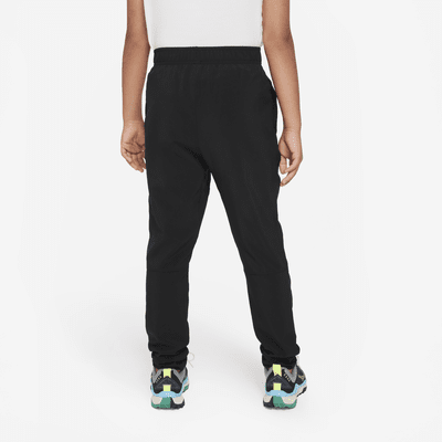 Nike Dri-FIT Older Kids' (Boys') Woven Training Trousers. Nike IN