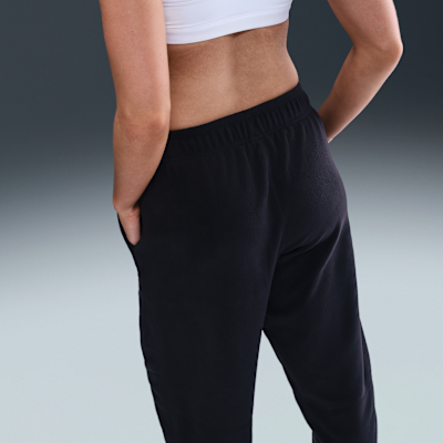 Pants de tejido Fleece Therma-FIT de tiro medio para mujer Nike One