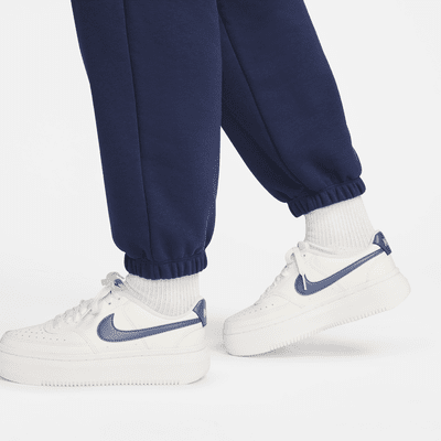 Pants de entrenamiento oversized de tiro medio para mujer Nike Sportswear Club Fleece