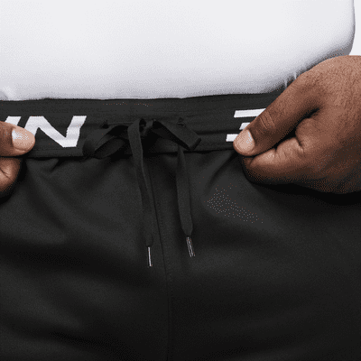 Träningsbyxor Nike Therma-FIT i avsmalnande modell för män