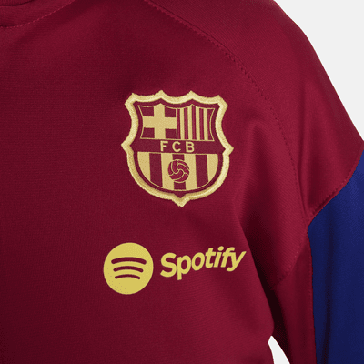 FC Barcelona Strike Nike Dri-FIT strikket fotballtracksuit til små barn