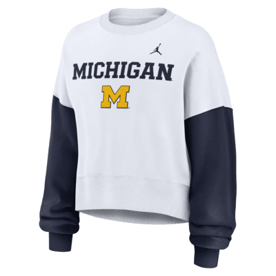 Sudadera de cuello redondo sin cierre universitaria Nike para mujer Michigan Wolverines Primetime