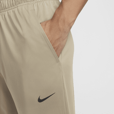 Nike Totality Men's Dri-FIT Open Hem Versatile Trousers. Nike MY