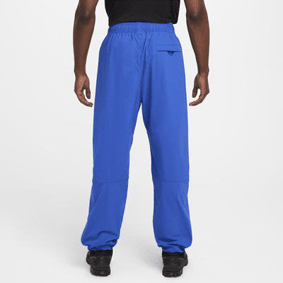 Calças folgadas entrançadas Nike Tech para homem