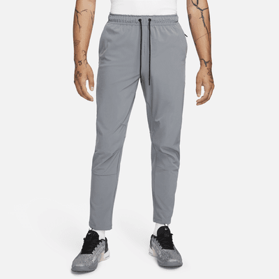 Pants versátiles Dri-FIT de pierna entallada para hombre Nike Unlimited