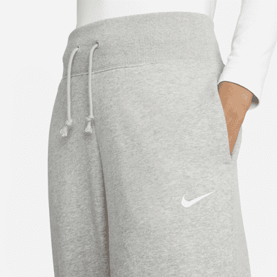 Calças de fato de treino a 7/8 delineadas de cintura subida Nike Sportswear Phoenix Fleece para mulher