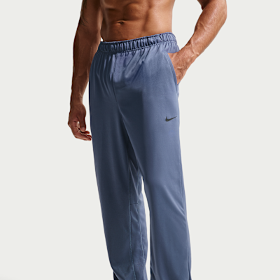Pants Dri-FIT versátiles con dobladillo abierto para hombre Nike Totality