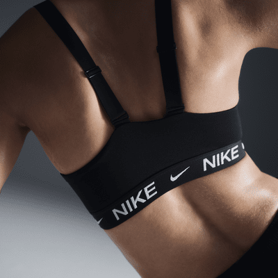 Dámská nastavitelná sportovní podprsenka Nike Indy s vycpávkami a střední oporou