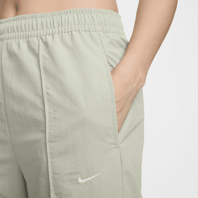 Pants de tiro medio con dobladillo abierto para mujer Nike Sportswear Everything Wovens