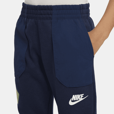 Pantalones de entrenamiento de tejido Fleece para niños talla pequeña Nike Sportswear
