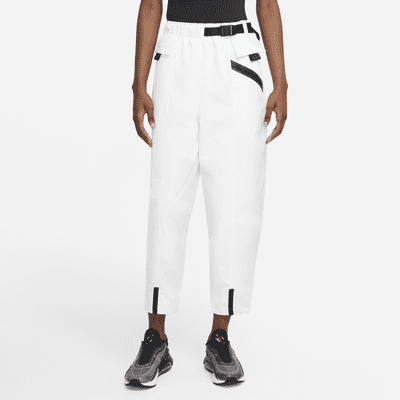 Pantaloni Curve in tessuto Nike Sportswear Tech Pack - Donna. Nike IT
