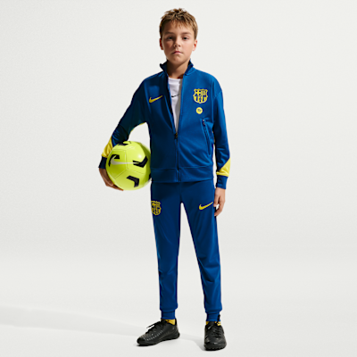 Fotbollstracksuit FC Barcelona Strike fjärdeställ Nike Dri-FIT för ungdom