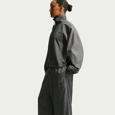 Pants de tejido Woven de tiro medio oversized para mujer Nike Sportswear