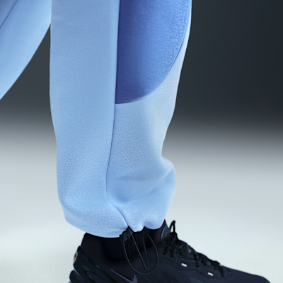 Calças de lã cardada com bainha aberta e bloco de cor Nike Tech para homem