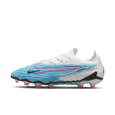 Tacos de fútbol de corte low para terreno firme Nike Phantom GX Elite