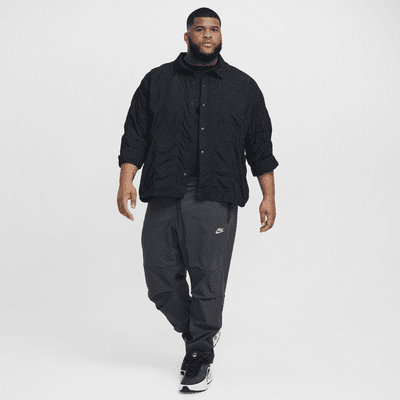 Pantaloni in tessuto Nike Tech – Uomo