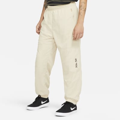 nike tracksuit bottoms with zips