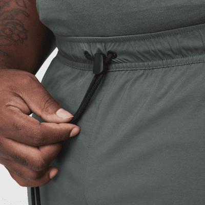Vævede Nike Tech-bukser til mænd