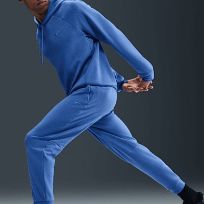 Joggers de alto rendimiento Dri-FIT con protección UV para hombre Nike Primary Fleece