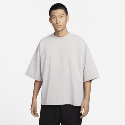 เสื้อแขนสั้นผู้ชายขนาดโอเวอร์ไซส์ Nike Sportswear Tech Fleece Reimagined