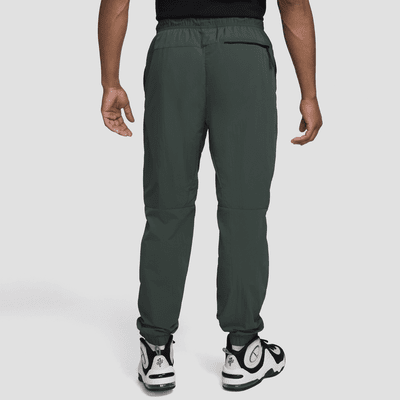 Pants de tejido Woven de pierna recta para hombre Nike Tech