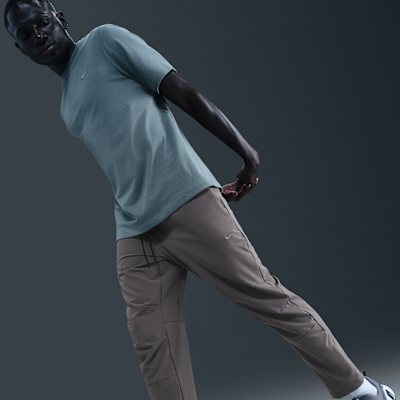 Pants versátiles Dri-FIT de pierna entallada para hombre Nike Unlimited