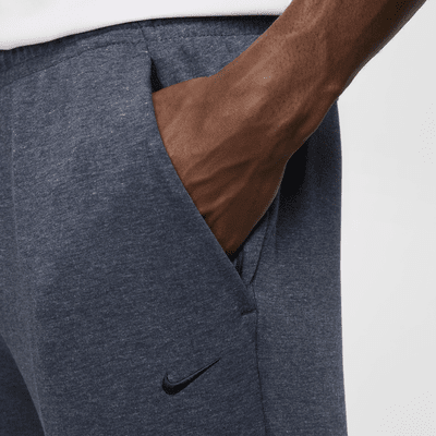 Pants Dri-FIT entallados versátiles con protección UV para hombre Nike Primary