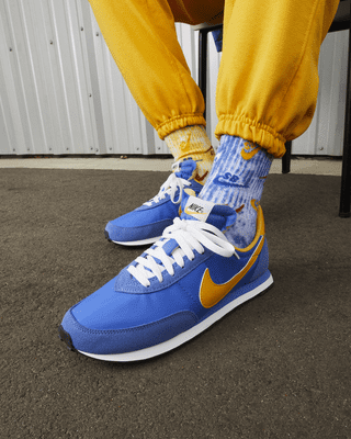 nike blue and yellow trainers