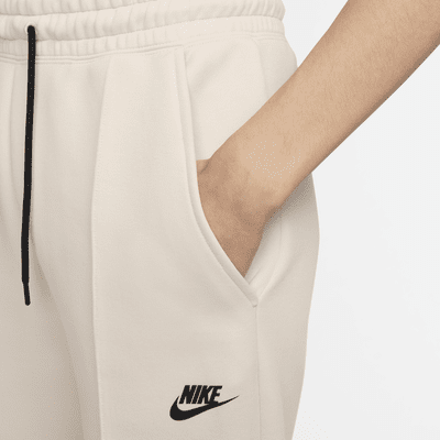 Pantaloni jogger a vita media Nike Sportswear Tech Fleece – Donna