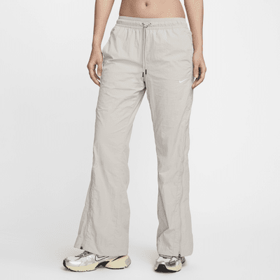 Pantalon à zip taille mi-haute déperlant Nike Sportswear Collection pour femme