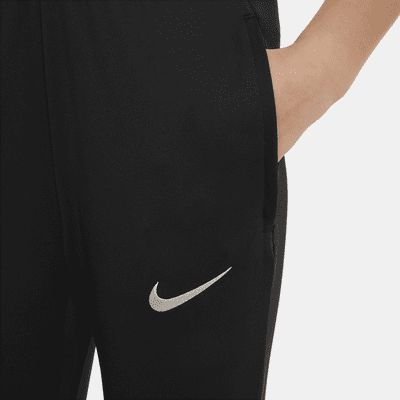 Ποδοσφαιρικό πλεκτό παντελόνι Nike Dri-FIT Μπαρτσελόνα Strike για μεγάλα παιδιά