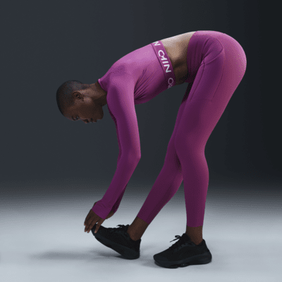 Leggings de 7/8 de tiro alto y sujeción media con bolsillos para mujer Nike Universa