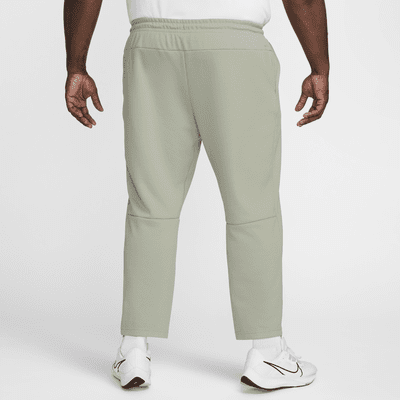 Pants Dri-FIT entallados versátiles con protección UV para hombre Nike Primary