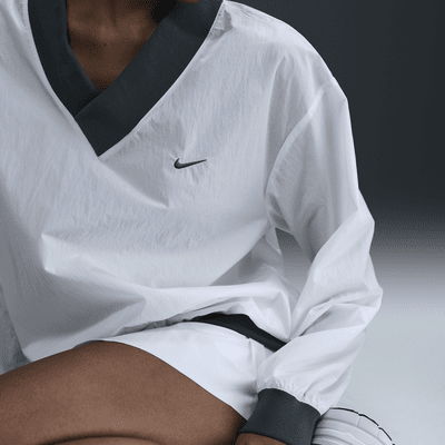 Maglia ampia in tessuto UV con scollo a V e manica lunga Nike Sportswear Essential – Donna