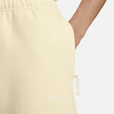 Pants de tejido Fleece con dobladillo abierto para hombre Nike Solo Swoosh