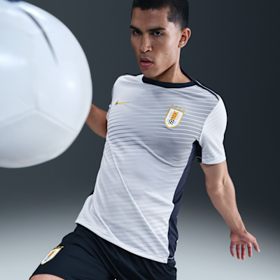 Playera de fútbol de manga corta Nike Dri-FIT para antes del partido para hombre Uruguay Academy Pro