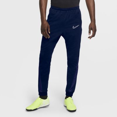 blue and yellow nike tracksuit