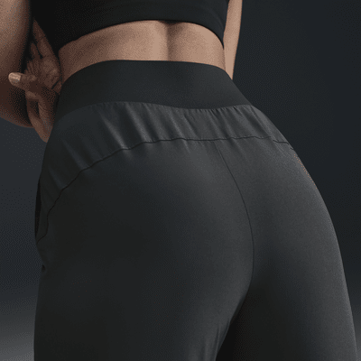 Pants de entrenamiento Dri-FIT de tiro medio para mujer Nike Bliss Victory