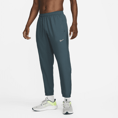 noche Deliberadamente computadora Nike Dri-FIT Challenger Men's Woven Running Trousers. Nike SA