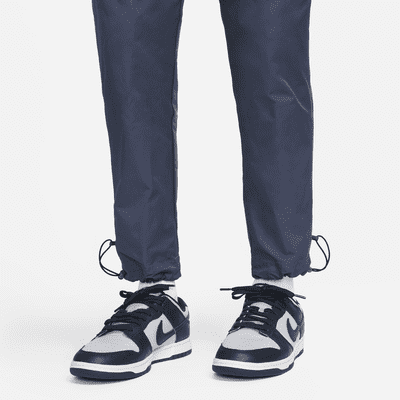 Pantaloni in tessuto Nike Sportswear Repeat – Uomo