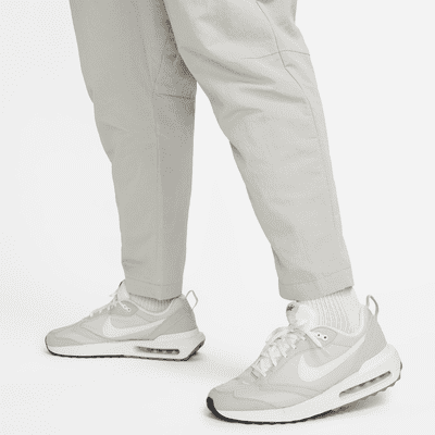 Nike Sportswear Tech Essentials Men's lined Commuter Pants. Nike.com